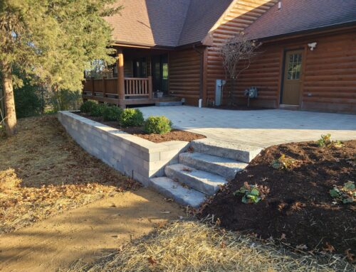 Patio with Wall and Fireplace Installation in Lyons, WI by Koch Kuts
