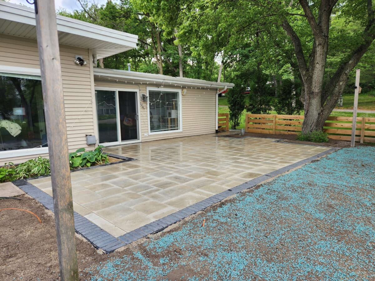 Paver Patio or Deck? The Honest Guide Nobody Gives You
